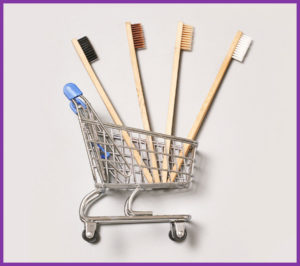 Shopping cart with toothbrushes in it