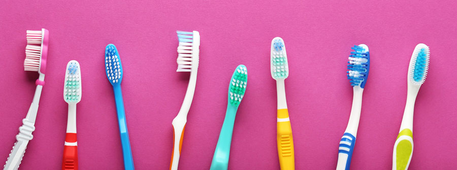 Line-up of various toothbrushes